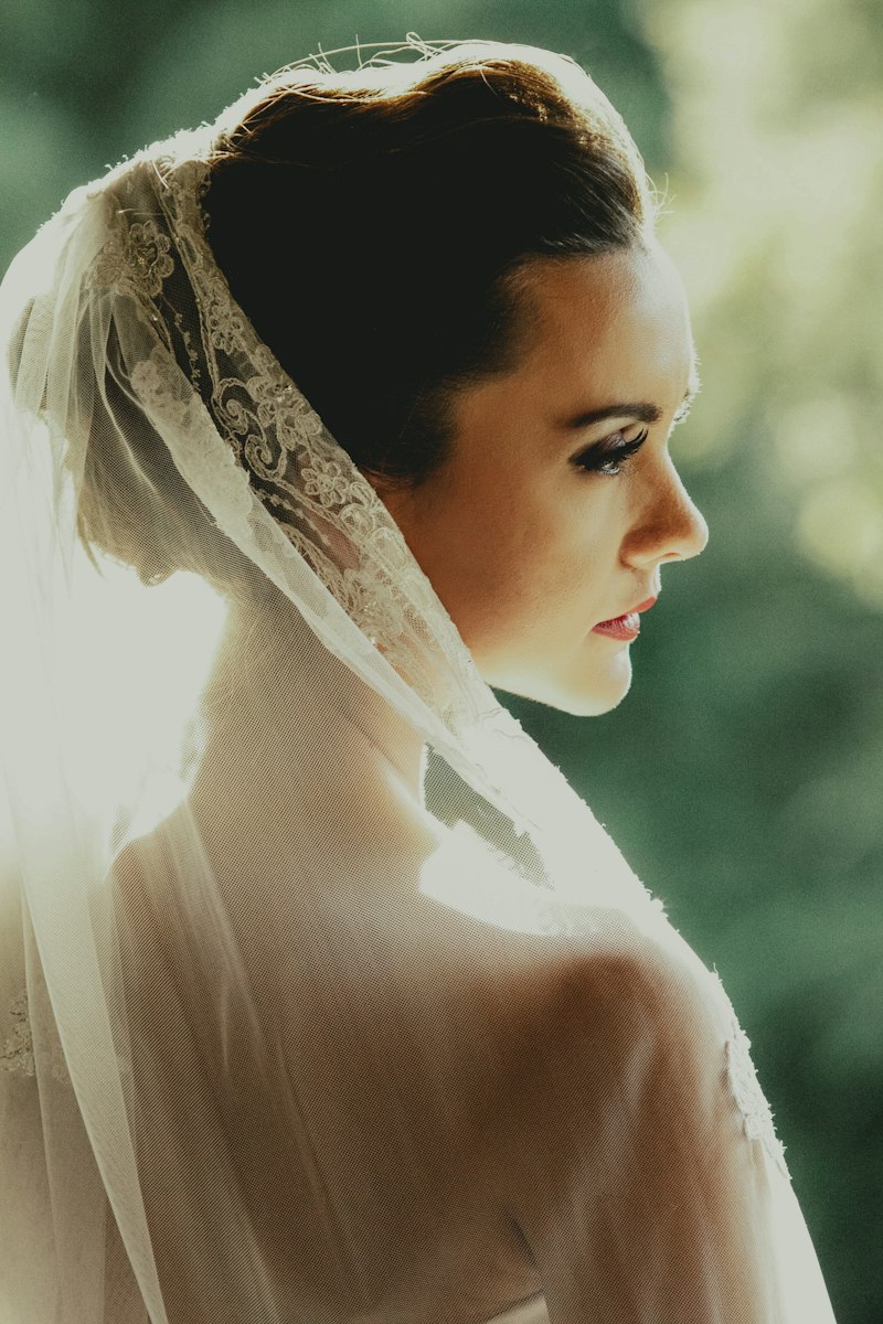 A bride wearing a long white veil